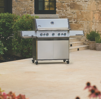a stainless steel washer and dryer in a kitchen